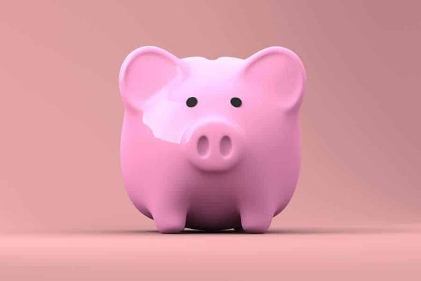 Financing the purchase of a home, symbolized by a piggy bank