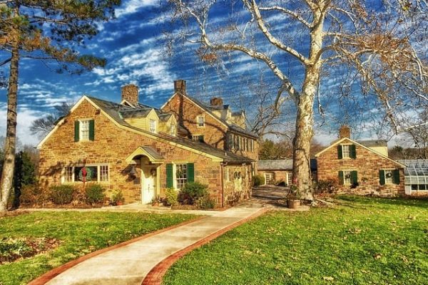 The last few leaves fall onto the lawn of a home for sale in San Marcos.