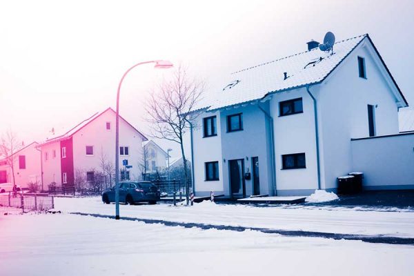 Snow-covered in the suburbs of a neighborhood San Marcos Tx Real Estate Agents are selling a house in