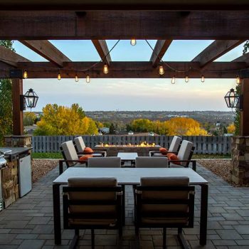 Brand new backyard deck with a table and seating