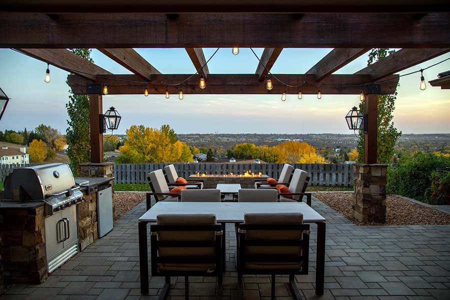 Brand new backyard deck with a table and seating