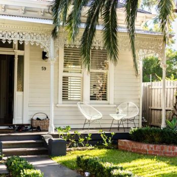 victorian house with beautiful white porch - sell your house real estate in San Marcos Tx