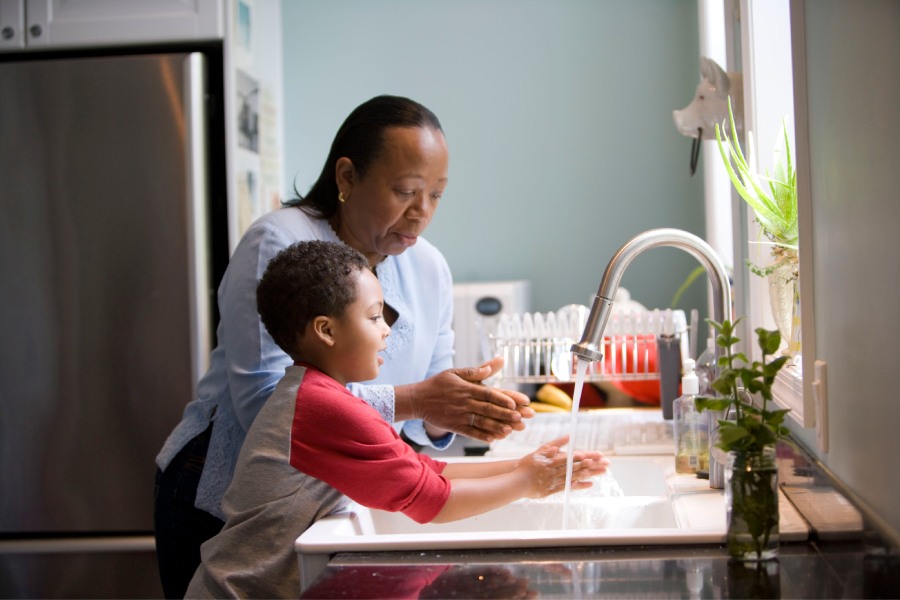 mom explaining to her kid that they are going to be moving houses and what that means to him